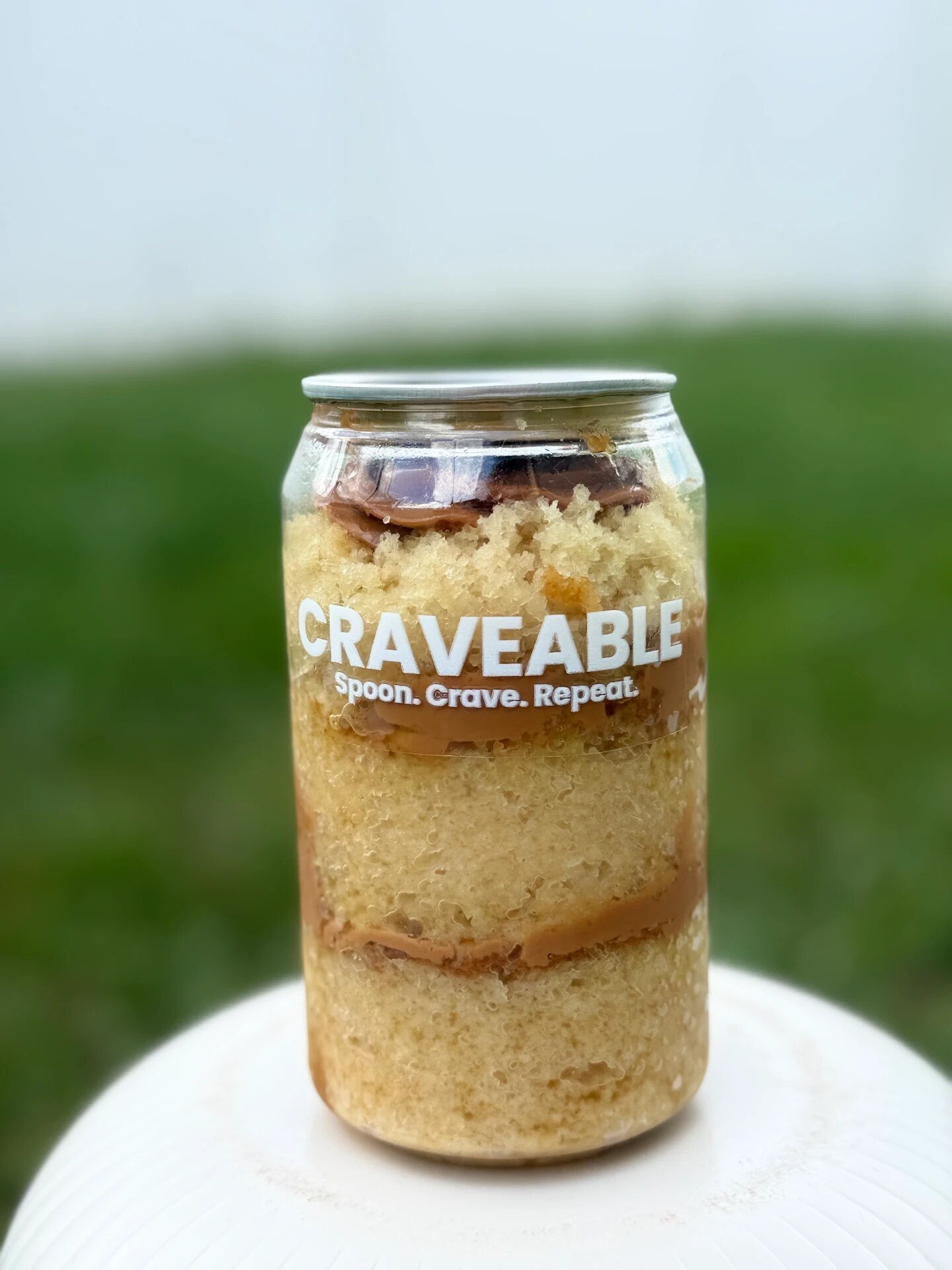 Caramel and sponge layers in a single can